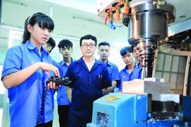 李自重技术高等专科学校师生在上课中。图自西贡解放报