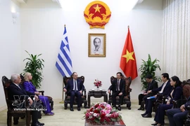 越南政府副总理胡国勇会见希腊议会第一副议长。图自越通社