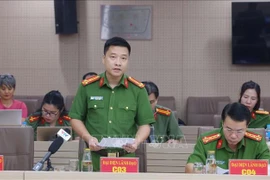 越南公安部经济、贪腐及走私犯罪调查局（C03）副局长武清松上校回答记者提问。图自越通社