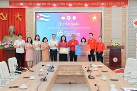 越通社向古巴提供援助。图自越通社