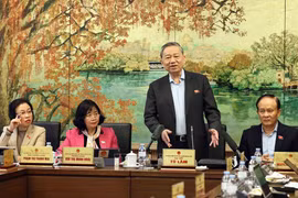 苏林总书记在会议上发言。图自越通社