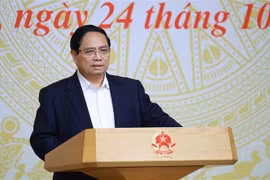 范明政总理在会议上发言。图自越通社