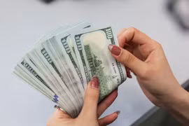 在金融中心发生的所有1000美元以上电子交易须上报。图自越通社