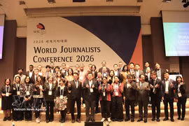 与会代表合影。图自越通社