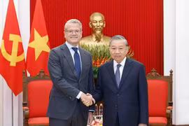 苏林总书记会见丹麦A.P.穆勒-马士基集团首席执行官柯文胜。图自越通社