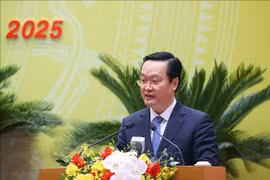 阮德忠同志发言。图自越通社