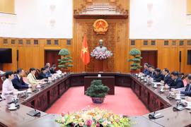 会见现场。图自越通社