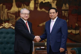 越南政府总理范明政会见日越友好协会关西地区分会主席祯西村。图自越通社