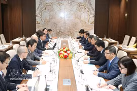 会见现场。图自越通社