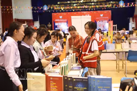 老挝第六届国际图书节现场。图自越通社