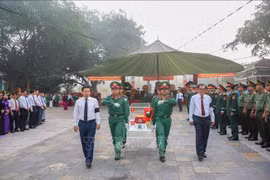 西宁省为在柬牺牲的146名烈士举行追悼会和遗骸安葬仪式式。图自越通社