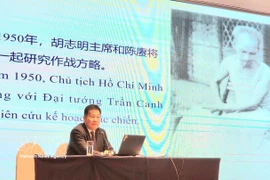 “胡志明在中国”专题座谈会现场。图自越通社