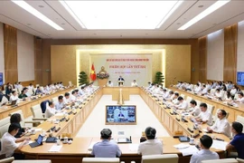 会议现场。图自越通社