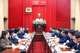 会见现场。图自越通社