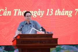 范明政总理在会议上发言。图自越通社
