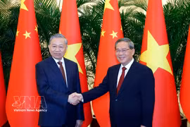 越共中央总书记、国家主席苏林会见中国国务院总理李强。图自越通社