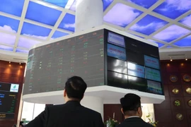越南股市吸引超过18亿美元资金流入，VN-Index再创历史新高。图自越通社