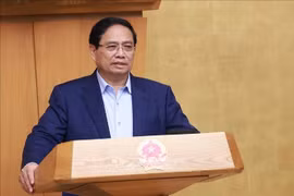 政府总理范明政主持召开政府9月份例行会议。图自越通社