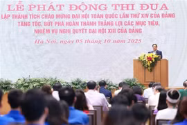 政府总理发起迎接越共十四大和第十六届国会选举的竞赛运动。图自越通社