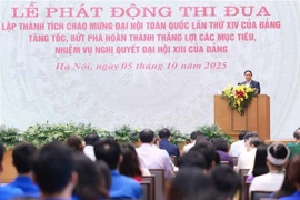 政府总理发起迎接越共十四大和第十六届国会选举的竞赛运动。图自越通社