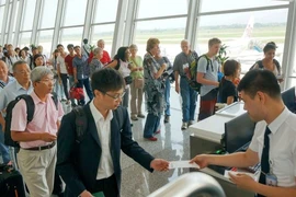 民众涌向河内观看九二阅兵 机票价格持续上涨。图自越通社