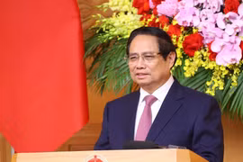 范明政总理发言。图自越通社