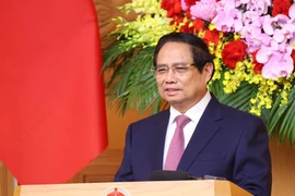 范明政总理发言。图自越通社