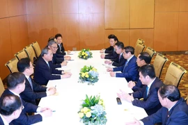 越南政府总理范明政与中国国务院总理李强举行会谈。图自越通社