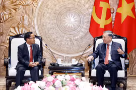越共中央总书记、国家主席苏林会见老挝副总理兼司法部长坎潘·彭玛塔。图自越通社