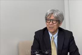 曾任共同社驻越南首席记者的三宅和久。图自越通社