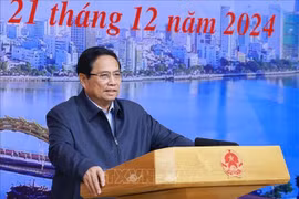 范明政总理在会议上发表讲话。图自越通社
