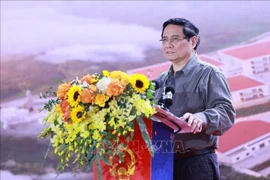 范明政总理发表讲话。图自越通社