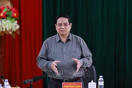 越南政府总理范明政发表总结发言。图自越通社