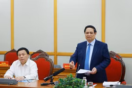 范明政总理发言。图自越通社