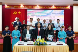 签约仪式现场。图自越通社