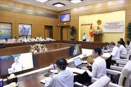 工作会议场景。图自越通社