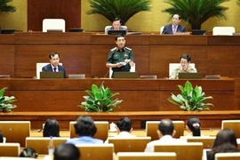 越南国防部长潘文江在会议上发言。图自越通社