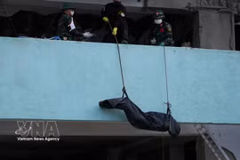 越南救援队在委内瑞拉地震中找到11具遇难者遗体。图自越通社