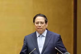 范明政总理发言。图自越通社