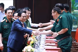 政府总理范明政出席全军军政会议。图自越通社
