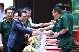 政府总理范明政出席全军军政会议。图自越通社