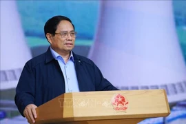 越南政府总理范明政发言。图自越通社