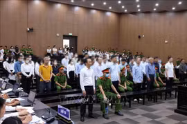 郑文决获减刑14年。图自越通社
