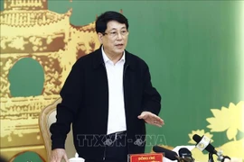 越南国家主席梁强在会议上发言。图自越通社