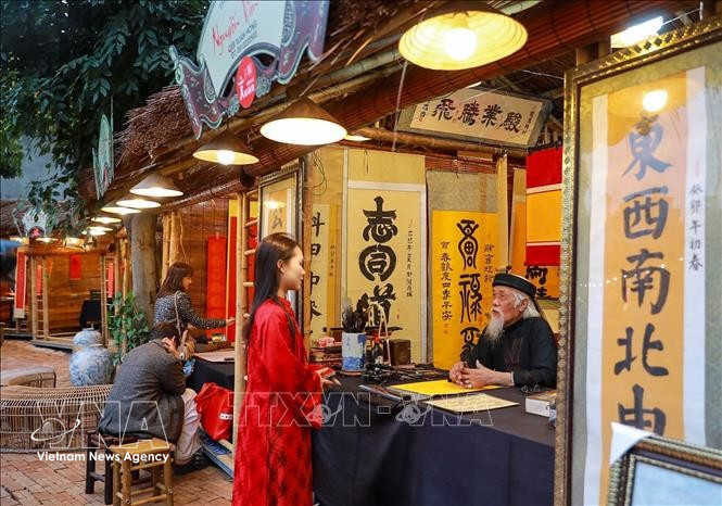 新春求字活动仍是书法节的核心亮点 图自越通社