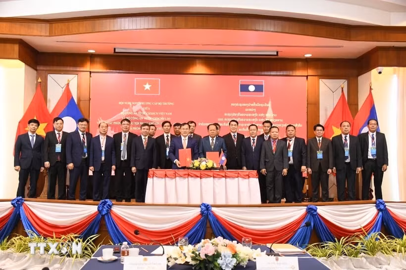 越南公安部与老挝公安部加强合作。图自越通社