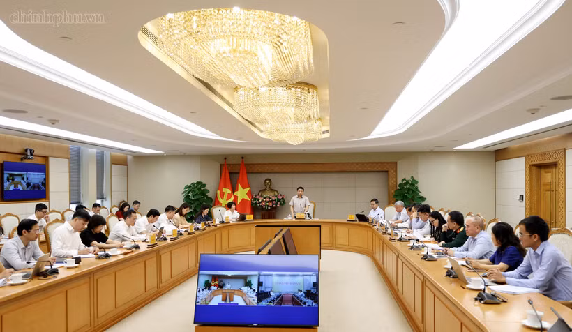 政府副总理、越南国际金融中心执行委员会主席阮文胜主持会议。图自chinhphu.vn