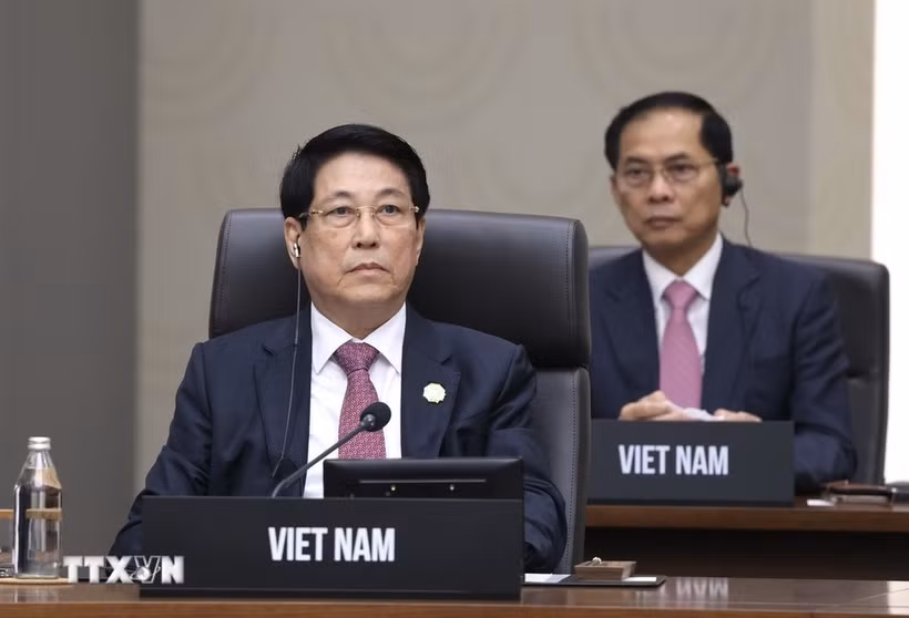 梁强出席第32届亚太经合组织峰会。图自越通社