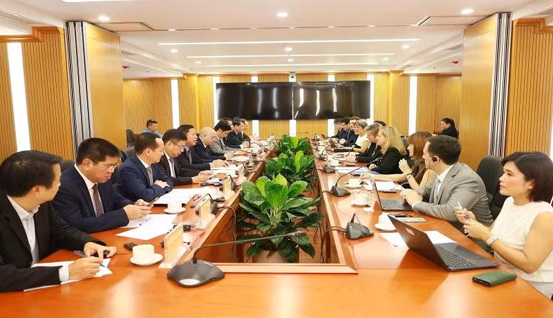 会议场景。图自人民报