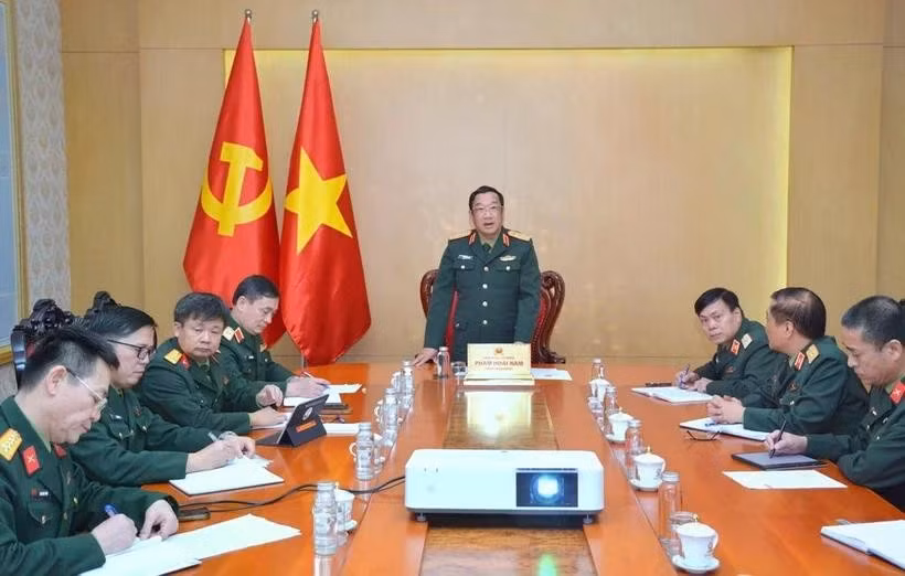 中央委员、国防部副部长范怀南主持会议。图自越通社